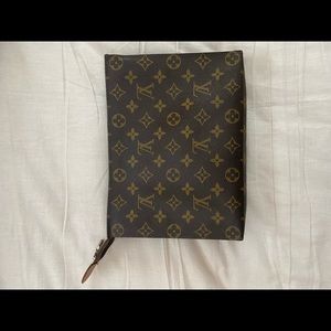 LV toiletry 26 with d rings added to use as a crossbody
